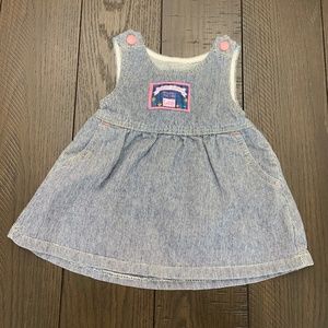 Infant girl’s sleeveless dress.